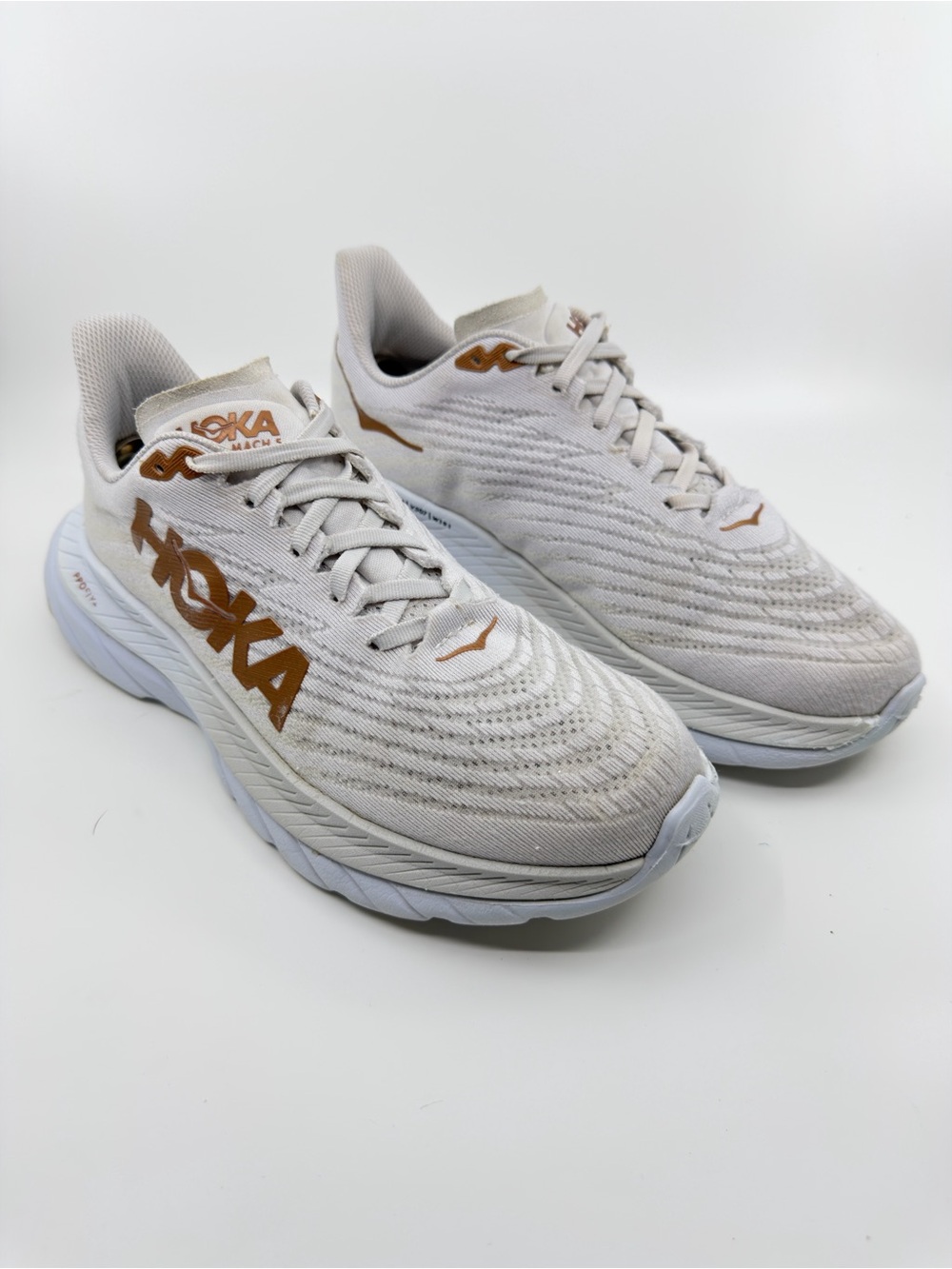 Hoka Mach 5 running shoes in the white and copper colorway, SZ 9